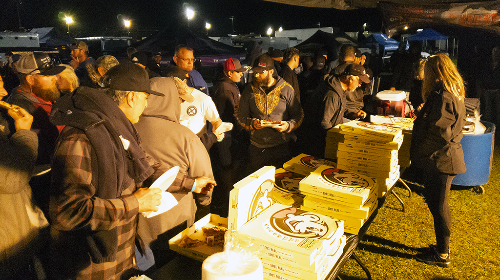 Drag Racers Eating Pizza at TREMEC Racer Appreciate Party