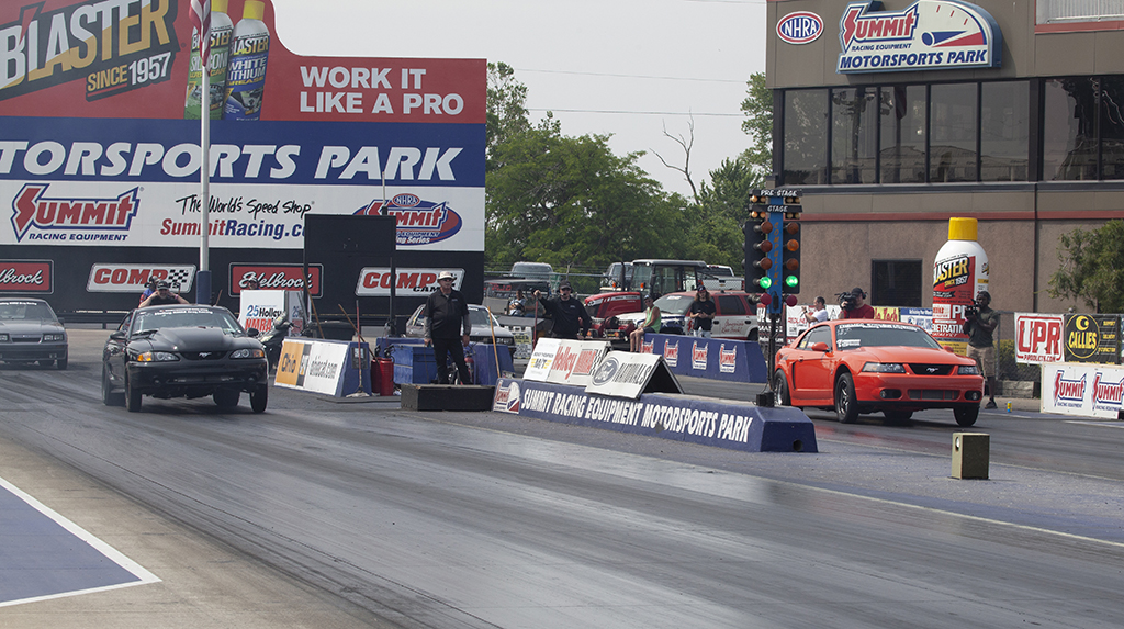 The final pairing of round one had Chris Rusch (left, 10.947 avg. E/T) against Scott Triolo (right, 11.307 avg. E/T) that gave Triolo the head start off the line. Triolo cut a .334 second light which gave some of it back to Rusch (.252 reaction time) and it was a race to the finish line. Triolo broke the beams first running a 10.434@120.77 with Rusch crossing the line at 10.65@140.02.