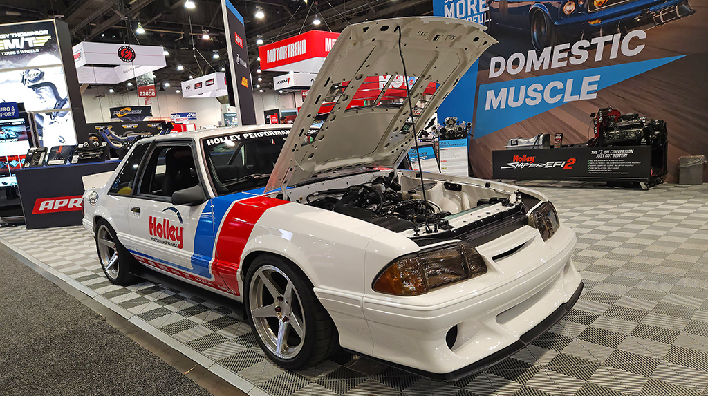 Spotted in the Holley booth was this cool 1989 Ford Mustang coupe. Set up to look like a road racer, this Mustang had all the Holley group goodies with Detroit Speed suspension (at the start of the show it was part of the Holley group) Holley EFI on its 363 Ford Performance crate engine hooked to a TREMEC TKX 5-speed transmission.