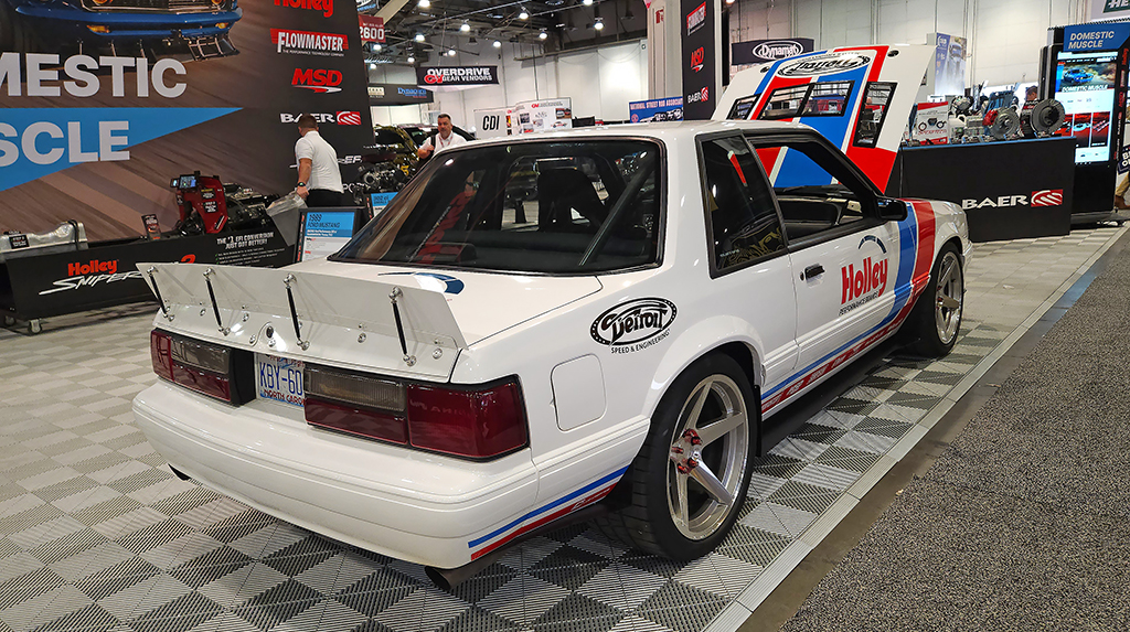 Spotted in the Holley booth was this cool 1989 Ford Mustang coupe. Set up to look like a road racer, this Mustang had all the Holley group goodies with Detroit Speed suspension (at the start of the show it was part of the Holley group) Holley EFI on its 363 Ford Performance crate engine hooked to a TREMEC TKX 5-speed transmission.