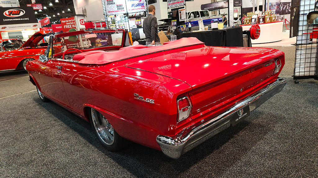 We spotted this interesting 1963 Nova SS in the RBS Coatings booth. Built by Cool Hand Customs, it had a TREMEC Magnum 6-speed transmission bolted to an LS V8 that was nestled in an aftermarket front subframe. The Canadian Acadian front grille is an interesting detail that sets it apart from common US Chevy IIs. 