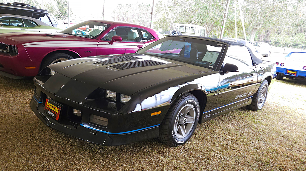 By the 1988 model year, the Chevrolet Camaro benefitted from the TREMEC T-5 5-speed transmission like its Mustang rival. But if it was a convertible (even a Z/28 or IROC) the fun of a manual transmission was only paired with the 305 small-block engine. Over the last few years prices have been steadily going up on 3rd Gen ragtops, though not as much as hoped by the seller of this IROC-Z who refused the highest bid of $15,000 on the car so it went to the Bid Goes On field.