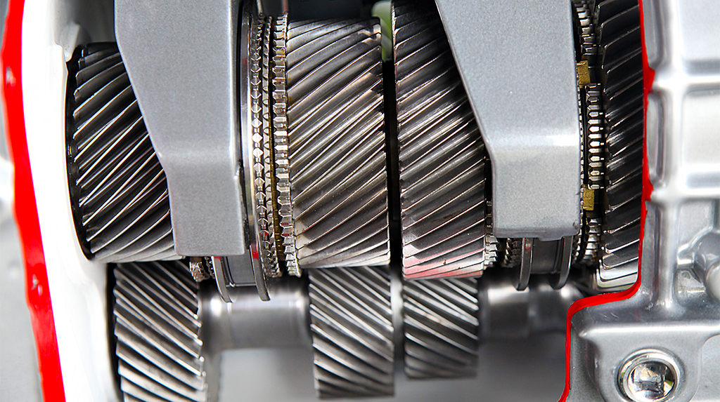 A close up of the internal helical cut gears of the TREMEC Magnum six-speed manual transmission