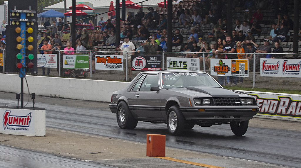 A 1981 Ford Mustang drag racing at Beech Bend Raceway