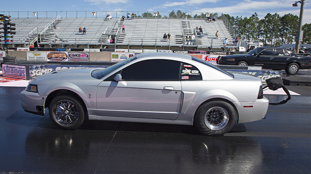 A silver 2003 Ford Mustang Terminator Cobra drag races at South Georgia Motorsports during the 2026 Mod Motor Nationals